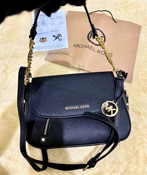 michael kors tas accessoires|Michael Kors leather accessories.